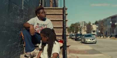 [rap music playing] - Charm City Kings