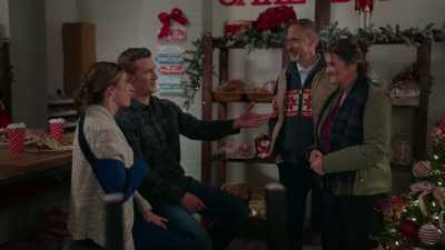 Rebecca, this is Joyce,
my mom, and Aaron, my dad. - Christmas Wreaths and Ribbons