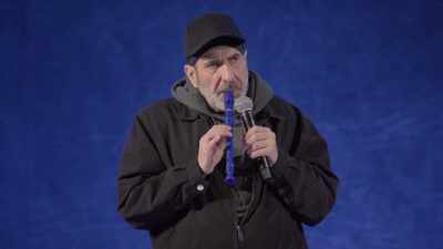 [recorder continues playing] - Dave Attell: Hot Cross Buns