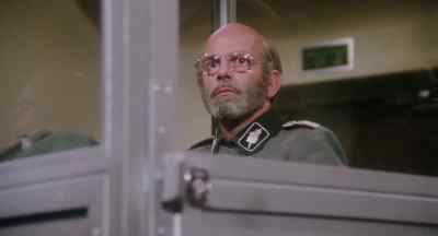 Remove the defendant from the booth. - The Man in the Glass Booth