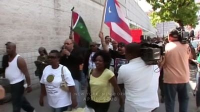 REPORTER: Hundreds of people
marched through Harlem - Sound of the Police