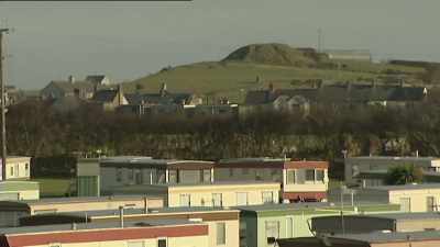 Reporter: Lisa was last seen
at this caravan site. - Murder in the Badlands