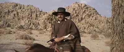Ride in this country without a gun.... - Mackenna's Gold