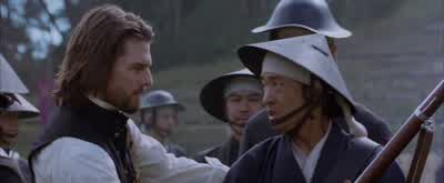 Rifle butt, against the shoulder. - The Last Samurai