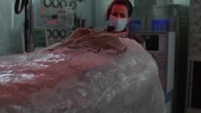 Right hand, right arm
and partial head exposed. - Stargate SG-1