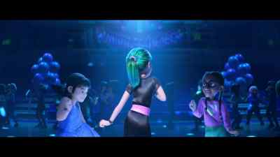 "Riley walks through the
celebration looking for her cohorts, - Dream Productions