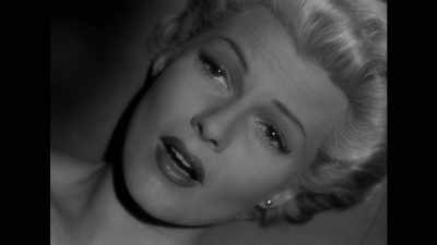 Rita Hayworth is floating in
a strange dislocated space. - Brainwashed: Sex-Camera-Power