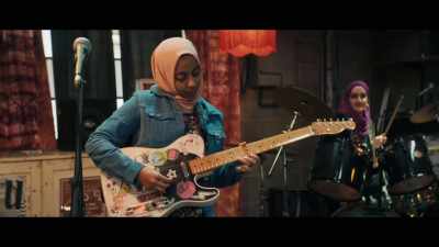 [rock music playing] - We Are Lady Parts