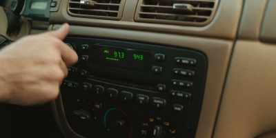 [rock song playing
       on car stereo] - The Death of Dick Long