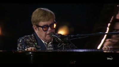 Roger Pope on drums, - Elton John Live: Farewell from Dodger Stadium