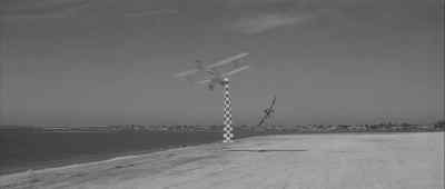 Round the first pylon again,
Burnham sets the pace, - The Tarnished Angels