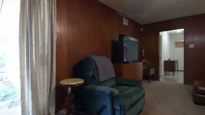 [Russell] All right.
So this room, brighten it up,
make it multi-functional, - Renovation Impossible