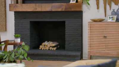 [Russell] Not only
did we paint the fireplace, - Renovation Impossible