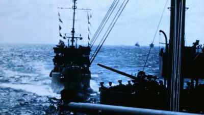 SAILORS CAN ONLY WATCH
HELPLESSLY FROM AFAR. - The Pacific War in Color