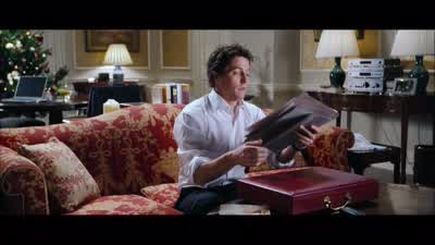Sam time for dinner I'm not hungrySam I've done chicken kebabsLook at the sign on the doorRight - Love Actually