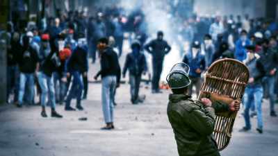Santos: ONCE WE'VE DIVIDED
THE WORLD INTO US AND THEM, - Why We Hate