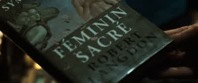 Saunière was reading his book. - The Da Vinci Code