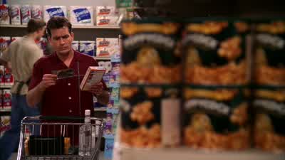 "Save 50 cents on one regular-sized Hamburger Helper "when you buy two of the following 10.5 ounce... - Two and a Half Men