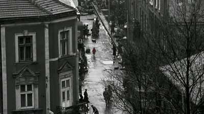 Schindler on horseback
watching these people
being rounded up. - Spielberg