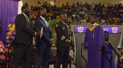 SCHOOL OFFICIAL [over microphone]:
Tygee Newman Hill. - Algiers, America