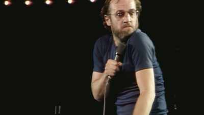 (SCOFFS, GROANS) None at all. - George Carlin's American Dream