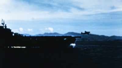 SCOUT PLANES HUNT OVER THE OPEN
SEAS ALL DAY, WITHOUT LUCK. - The Pacific War in Color