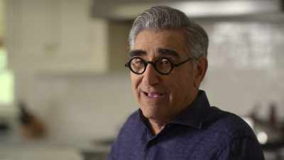 Scuba diving by scooter with sharks." - The Reluctant Traveler with Eugene Levy