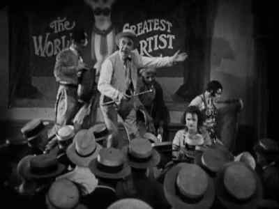 See her do the dance that 
broke the Sultan's thermometer. - The Unholy Three