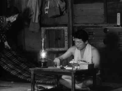 See? Even the futon is damp. - Woman in the Dunes