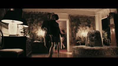 See that man sitting on the sofa? - RocknRolla