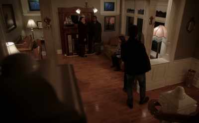 Seeing the words
written on the mirror, - Aurora Teagarden Mysteries: Haunted By Murder