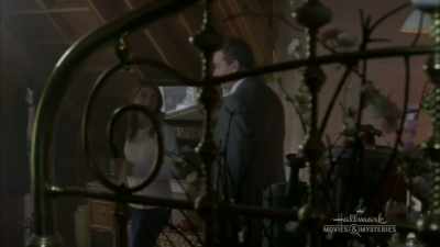 Seems like she was holding
her cell phone - Garage Sale Mystery: The Art of Murder
