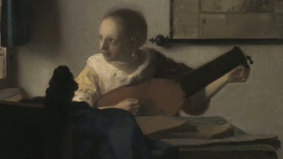 She appears to be tuning the lute
after playing, perhaps, - Vermeer: The Greatest Exhibition
