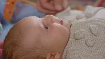 She can find her mouth
with her fist, - The Human Body: Secrets of Your Life Revealed