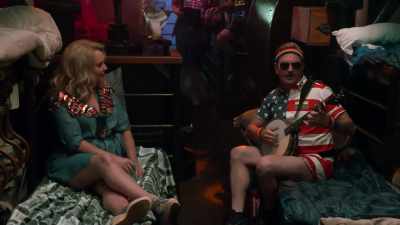 ♪ She dashed by me
in painted-on jeans ♪ - Reno 911! The Hunt for QAnon
