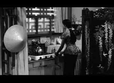 She faces situations in her own way.
She's getting the supper. - The Quiet American