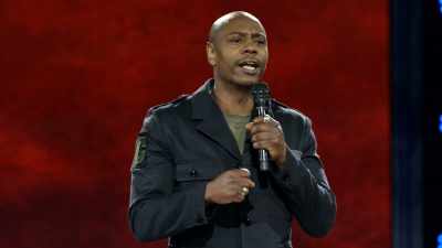 She goes, "Good luck to you,"
and she held me for a long time. - Dave Chappelle: The Age of Spin