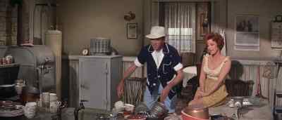 She got it right in the kisser. - Mr. Hobbs Takes a Vacation