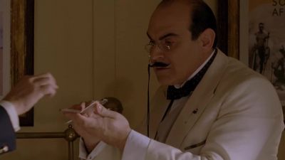 She was holding this. - Agatha Christie's Poirot