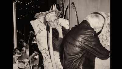 She was in the bed, and I was
leaning up against her, - Raise Hell: The Life & Times of Molly Ivins