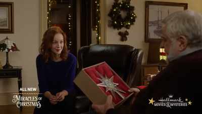 She just loved the way
the light reflected from it. - Swept Up by Christmas