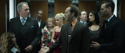 She just pressed the stop button - Elevator