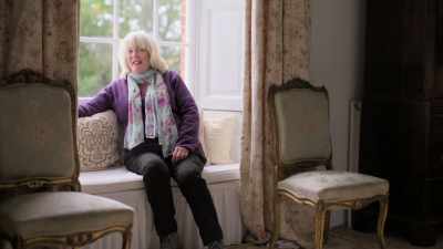 -- SHE LAUGHS - Extraordinary Escapes with Sandi Toksvig