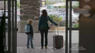 She was looking down the road
as if... - Signed, Sealed, Delivered: The Road Less Traveled