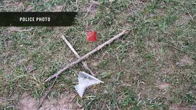 She made an X
where she had found it - Buried In The Backyard