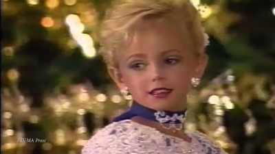 She has makeup on and --
and lipstick and big hair, - How It Really Happened