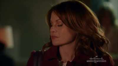 She never lived in Spokane
with them and she only moved - Dead Over Heels: An Aurora Teagarden Mystery