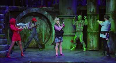 She ran Tromaville Escort Service, - The Toxic Avenger: The Musical