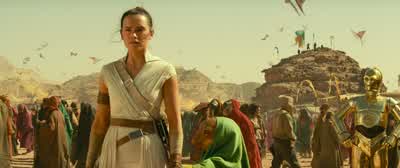 She is saying WelcomeHer name is Nambi GhimaThat's an excellent name I'm ReyShe would be honored to know your family name tooI don't have oneI'm just Rey - Star Wars: Episode IX   The Rise of Skywalker