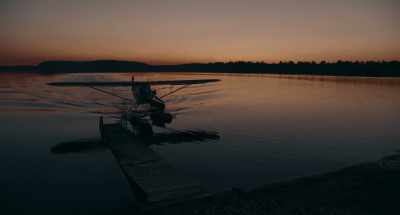 She sent me a postcard, - Through Black Spruce